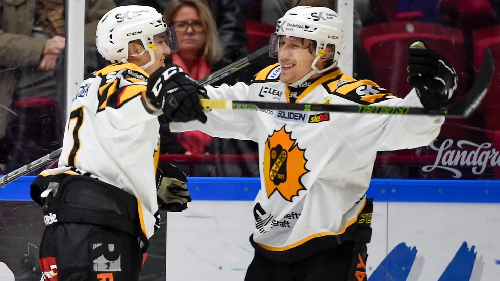 Pär Lindholm och John Norman i samma kedja igen. Foto: Björn Lindgren/TT.