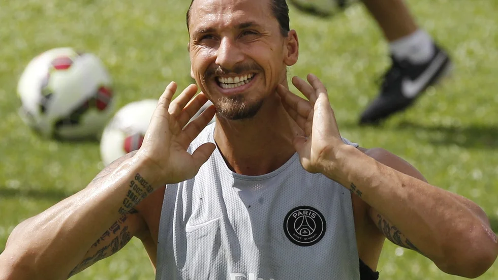 Zlatan Ibrahimovic of Paris Saint-Germain gestures during a training session in Hong Kong Sunday, July 27, 2014. Paris Saint-Germain will play a friendly match against local football team Kitchee on July 29. (AP Photo/Kin Cheung)