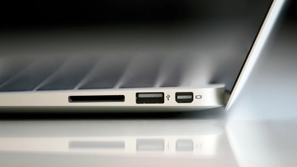 FILE - In this Wednesday, Oct. 20, 2010, file photo, the new Apple Macbook Air laptop is seen on display at Apple headquarters in Cupertino, Calif. In 2008, Apple started selling the MacBook Air, notable for being thin and light. (AP Photo/Tony Avelar, File)