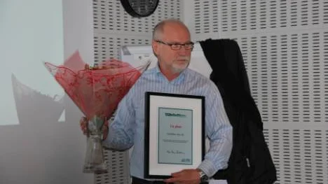 Sture Åberg, Malmfälten i Norr, med diplom och blommor. Företaget har ökat omsättningen mest under 2012 i Norrbotten.