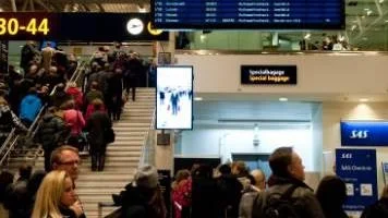 Passagerare på Arlanda flygplats.