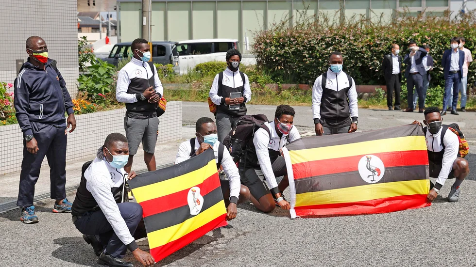 Medlemmar ur Ugandas OS-trupp vid ankomst till Japan. Arkivbild.