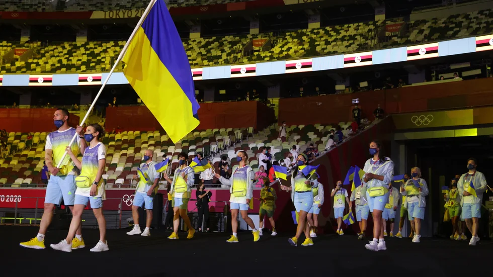 När Ukrainas idrottare gick in under OS-invigningen visade sydkoreansk tv bilder på kärnkraftverket i Tjernobyl.