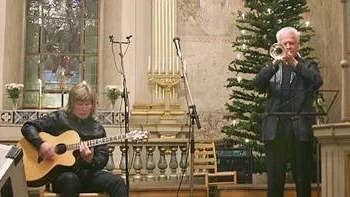 Janne Schaffer och Jan Allan i Östervåla kyrka.
