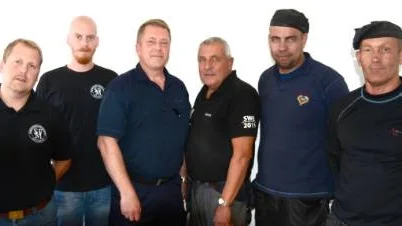 Fredrik Adler och Emil Holgersson från Skorstensfejarmästarna syd, Roger Landelius, Räddningstjänsten, Bengt Ring som kommer att ansvara för brandskyddstillsynen och sotarna Tobias Ring samt Teppo Ollila. Foto: Hans Brandin