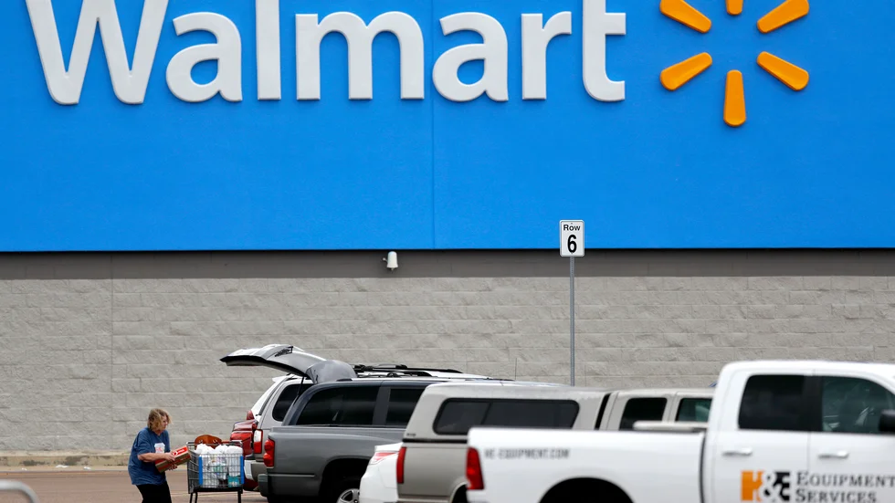 Vinstlyft för Walmart i krisen. Arkivbild