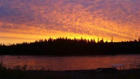 En soluppgång vid Piteälven, i närheten av Benbryteforsen