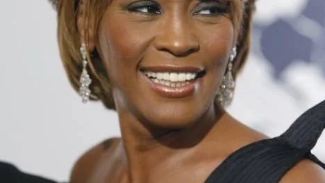 File- In this Oct. 28, 2006, file photo, musician Whitney Houston arrives at the 17th Carousel of Hope Ball benefiting the Barbara Davis Center for Childhood Diabetes in Beverly Hills, Calif. Houston died Saturday, Feb. 11, 2012, she was 48. (AP Photo/Matt Sayles)