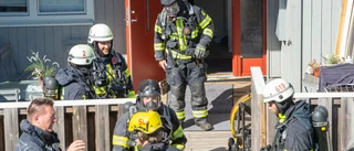 Pådrag efter spisbrand i radhus