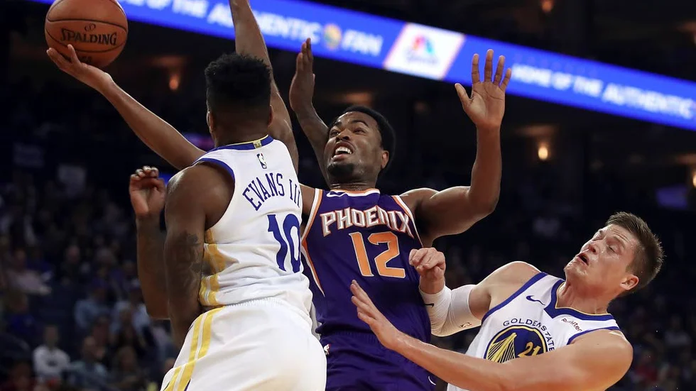 Jerebko (till höger) i Golden State Warriorslinnet.