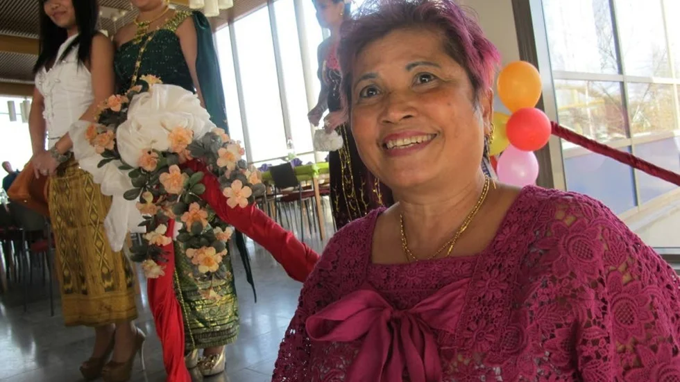 Thida Tongsekul från Mellanboda bjöd ett brett nyårsleende till alla gästerna.