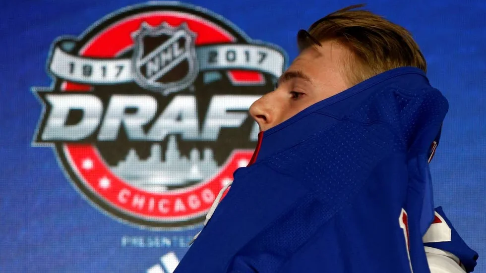 Lias Andersson holds a New York Rangers jersey after being selected by the team in the first round of the NHL hockey draft, Friday, June 23, 2017, in Chicago. (AP Photo/Nam Y. Huh)