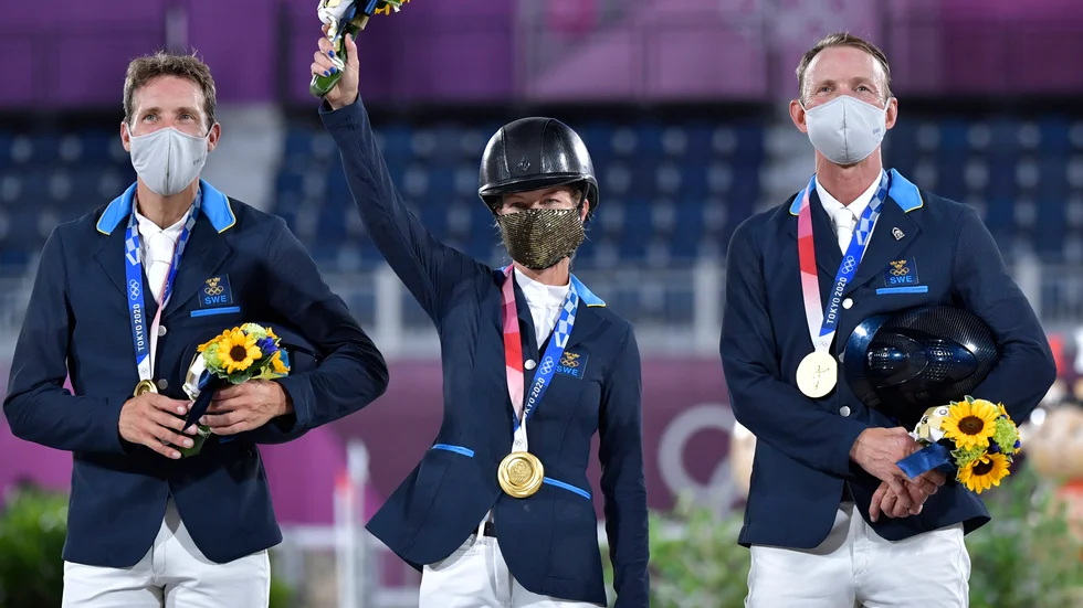 Henrik von Eckermann, Malin Baryard Johnsson och Peder Fredricson under guldceremonin.