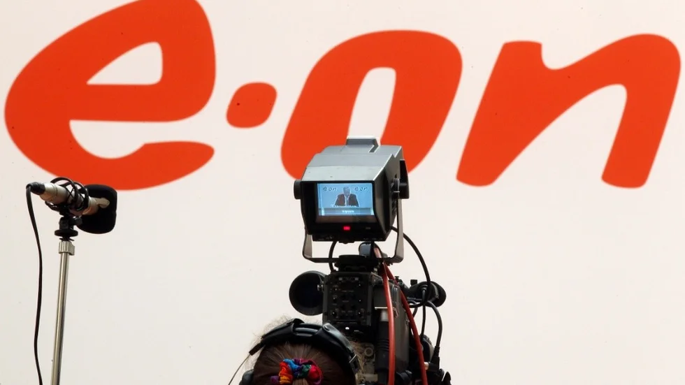 FILE - In this March 9, 2011 file photo Johannes Teyssen, CEO of the energy supplier E.ON, is seen on a camera screen as he addresses the media during the annual balance news conference held at the company's headquarters in Duesseldorf, Germany. German electricity and gas supplier E.ON says Wednesday, Aug. 10, 2011, it lost euro 1.49 billion (US dollar 2.13 billion) in the second quarter because of the government's decision to shut down nuclear plants early after the Fukushima nuclear disaster in Japan. The net loss compares to profit of euro 1.72 billion a year ago. Sales rose 35 percent to euro 25.2 billion. (AP Photo/Frank Augstein)