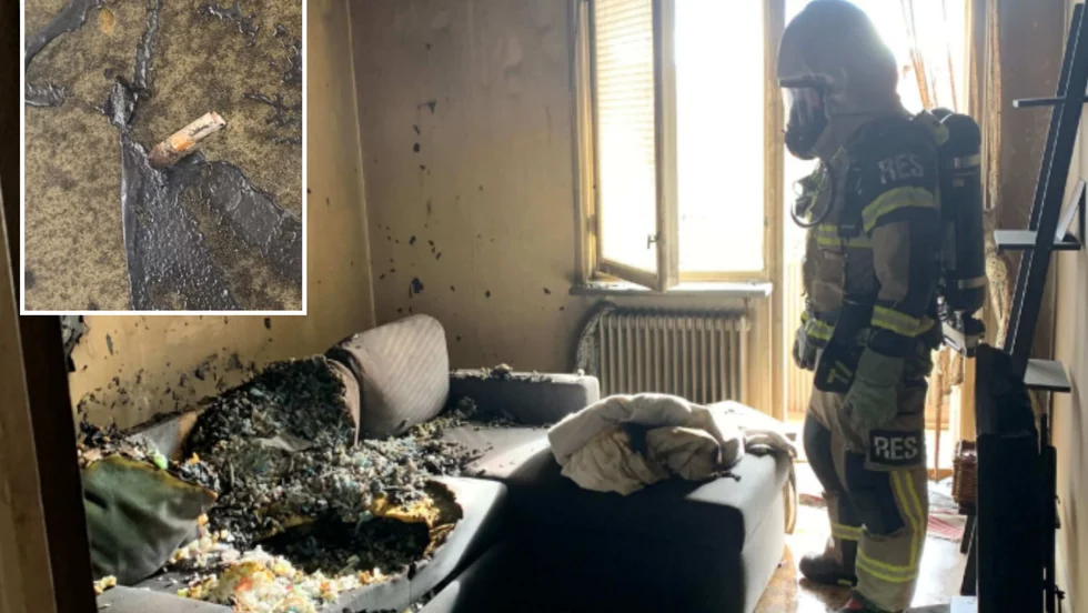 Kvinnan, som är i 30-årsåldern, är misstänkt för allmänfarlig vårdslöshet efter att ha sovit med en tänd cigarett som tog fyr på hela vardagsrummet.
