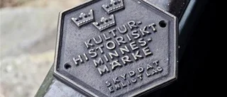 Tar ner skylten om byggnadsminne