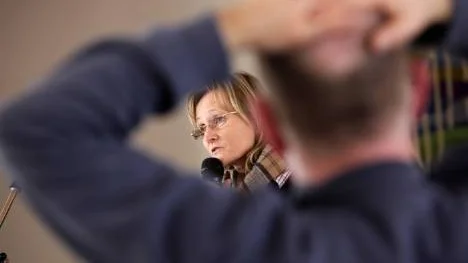 Kyrkoherde Maria Berg kritiseras hårt av många anställda och anklagas för att ljuga om hur församlingens personal mår efter sammanslagningen.