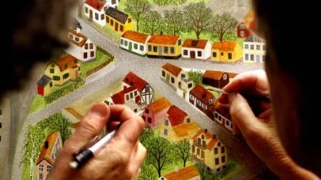 Skorsten. Kan du göra en stor, vit skorsten på huset? Klart att Titti Winbladh kan och snart ser huset på Odalgatan ut nästan som på riktigt.