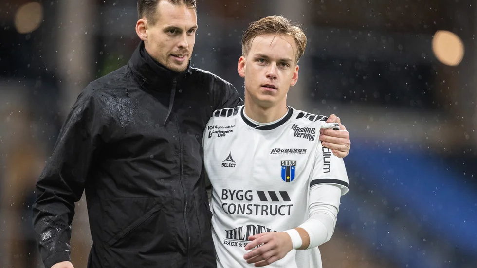 Hannes Sveijer tillsammans med tränaren Daniel Bäckström.