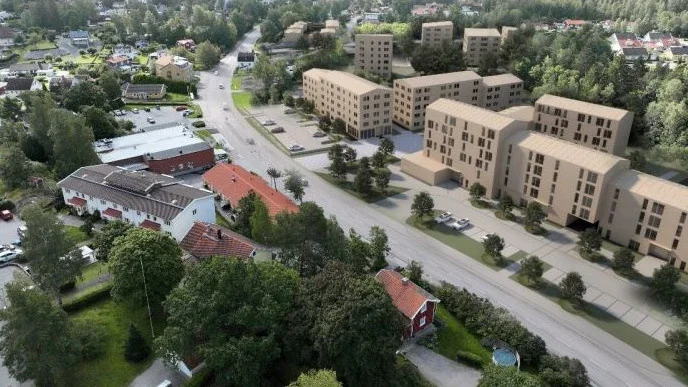 Illustration som visar Skogstorps centrum med de två centrumkvarteren, punkthus och längre bort radhus vid Borgvägen.