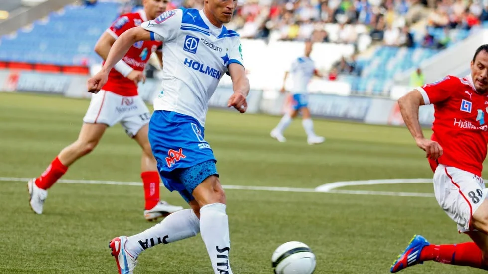 Tror på IFK. Shpetim Hasani, här i IFK-dressen, menar att "Peking" har  bra chanser mot FC Pristina. "Jag tror Norrköping tar sig vidare", säger anfallaren som har sina rötter i Kosovo.
