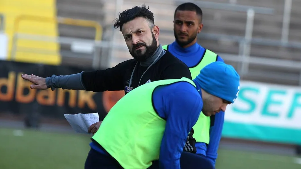 Simon Dogan.