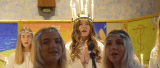 Luciatåg i regnbågsfärger