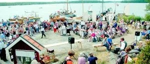 Gamla träbåtar som en röd tråd 	på Rågödagen