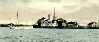 Husen i hamnen för hundra år sedan