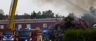 Garage revs för att rädda grannhus vid brand