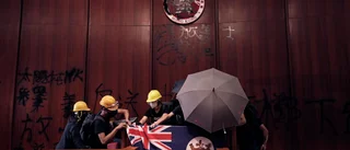 13 inför rätta för stormningen i Hongkong