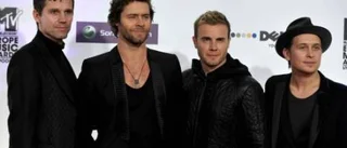 Take That och Robbie i studion