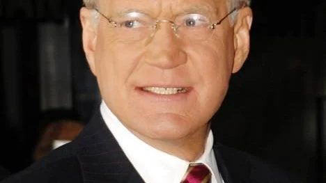 FILE - In this Jan. 17, 2008 file photo, television talk show host David Letterman walks out of The Ed Sullivan Theater during a taping of "The Late Show with David Letterman", in New York. (AP Photo/Evan Agostini, file)