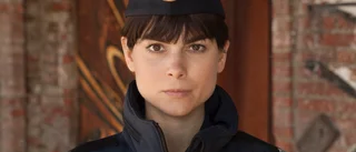 Då dyker Katarina Huss upp i rutan