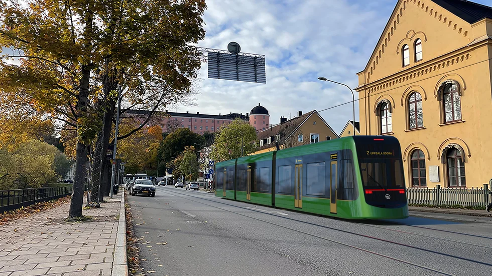 Visionsbild på hur spårvägen kan se ut när den rullar genom centrala Uppsala.