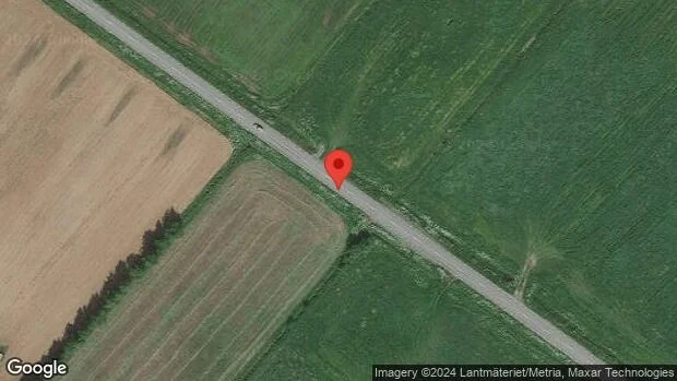 Ett körfält blockerat på grund av en stillastående fordon på väg 383