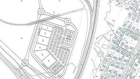 Här, nordväst om Backcity, skissar exploatören på lokaler och parkeringar.