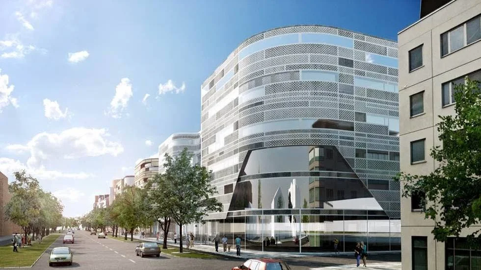 Vid ån. Nya bostadshus planeras nära Fyrisån. Slutligt utseende bestäms senare. Vy mot Östra Ågatan norrut vid Strandbodgatan.
