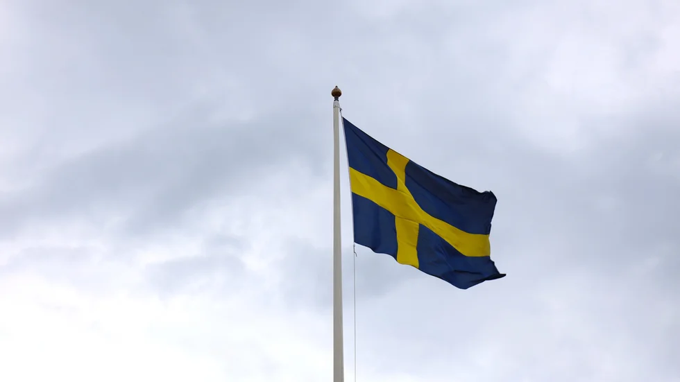 Den svenska flaggan i topp.