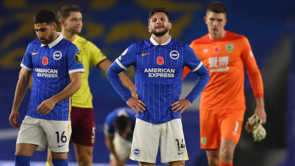 Uppgivna miner hos Adam Lallana och de andra Brightonspelarna under matchen mot Burnley.
