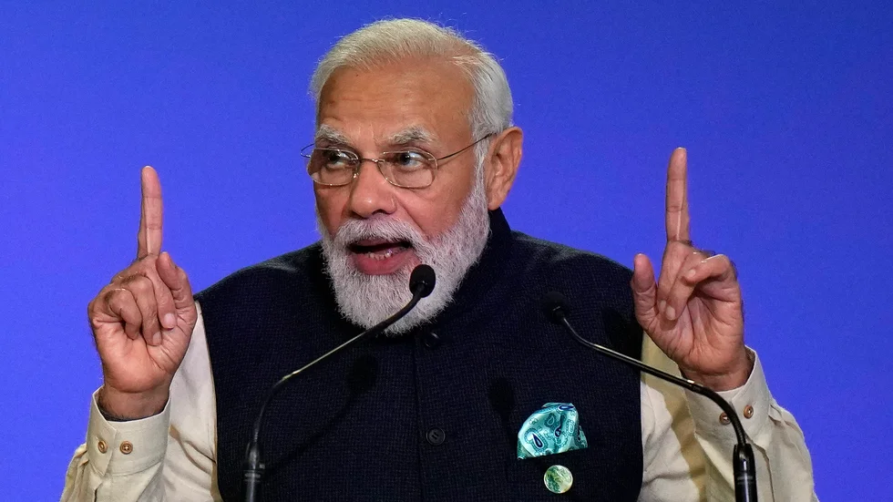 Indiens premiärminister Novandra Modi talar vid klimattoppmötet i Glasgow.
