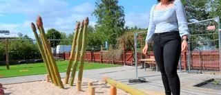 Lek och bus i grönsaklandet i Stadsparken