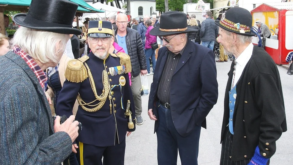 Välklädda herrar på Gammaldags marknad 2016.