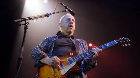 Mark Knopfler.