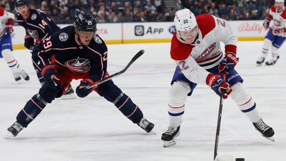 Patrik Laine, till vänster, fick med sig ett mål och två assist i matchen hans Columbus vann över Montreal efter 5-2.