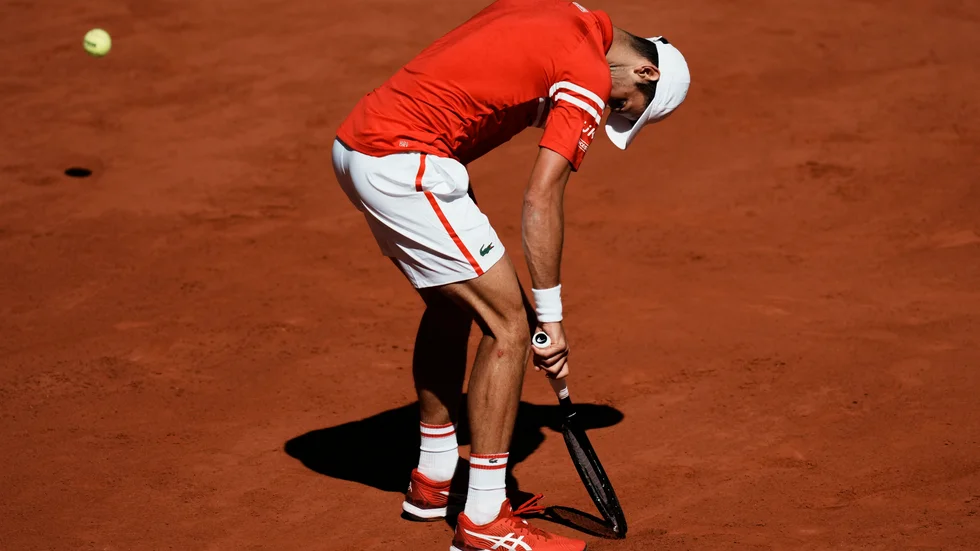 Serben Novak Djokovic och partnern Carlos Gomez-Herrera kommer inte till spel i dubbelfinalen.