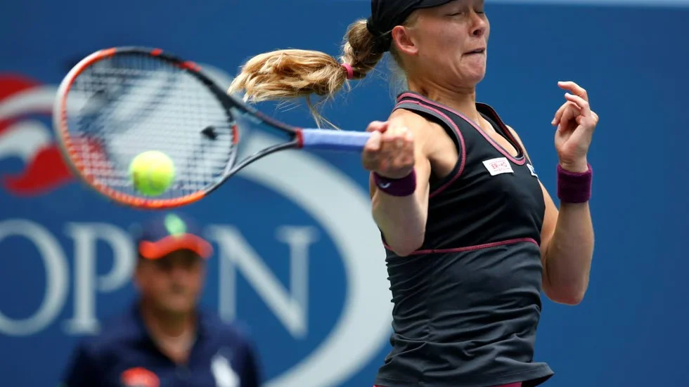 Johanna Larsson, of Sweden, returns a shot to Serena Williams during the third round of the U.S. Open tennis tournament, Saturday, Sept. 3, 2016, in New York. (AP Photo/Jason DeCrow)