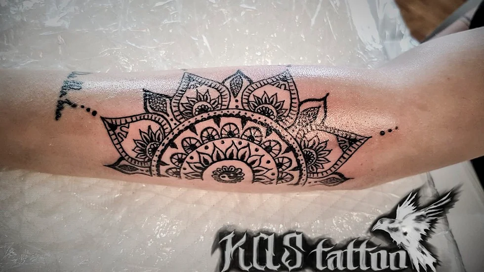 En av Katarzynas tatueringar.