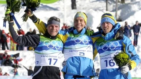 WHISTLER 20100220
Silver medalist Tobias Angerer, Germany, Gold medalist Marcus Hellner, Sweden, and bronze medalist Johan Olsson (16) Sweden pictured during the flower ceremony after the men's 30 km skiathlon competition at the Whistler Olympic Park during the Olympic Games in Vancouver, Canada, February 20, 2010. 
Photo: Tobias Röstlund / SCANPIX Kod: 1014