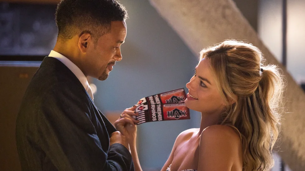 Charmar publiken. Will Smith och Margot Robbie är en vinnande duo i charmigt underhållande thrillerkomedin "Focus". Foto: Frank Masi Foto: Frank Masi.